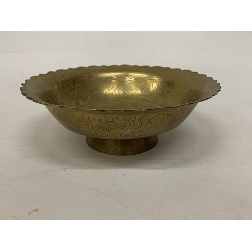 399A - A VINTAGE CHINESE ENGRAVED BRASS DRAGON BOWL WITH A SCALLOPED EDGE - 8 CM (H), 23 CM (D)