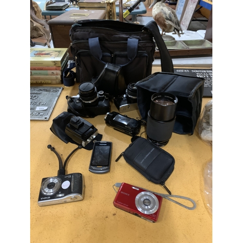 456 - A COLLECTION OF CAMERAS TO INCLUDE OLYMPUS, SONY CYBERSHOT, ETC PLUS ASAMSUNG PHONE, BAGS, ETC