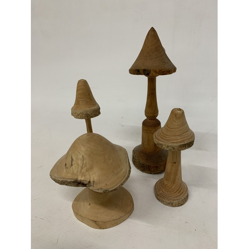 463 - A COLLECTION OF HAND TURNED AND CARVED WOODEN MUSHROOMS