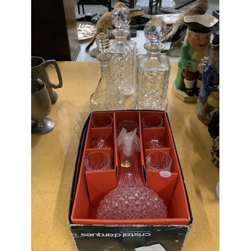 470 - A QUANTITY OF GLASSWARE TO INCLUDE A BOXED DECANTER AND GLASS SET, WHISKY TUMBLERS, THREE DECANTERS,... 