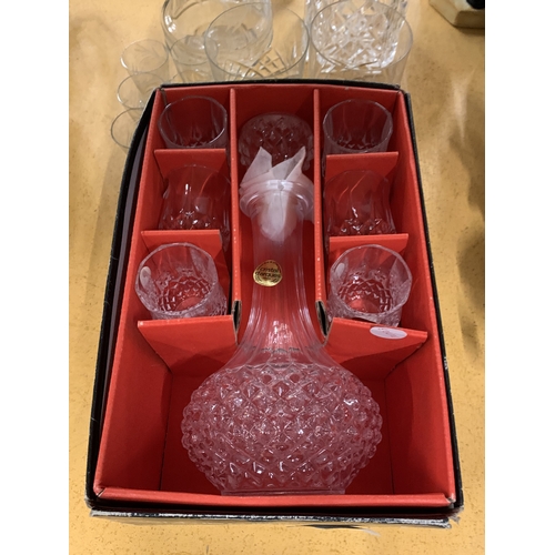 470 - A QUANTITY OF GLASSWARE TO INCLUDE A BOXED DECANTER AND GLASS SET, WHISKY TUMBLERS, THREE DECANTERS,... 