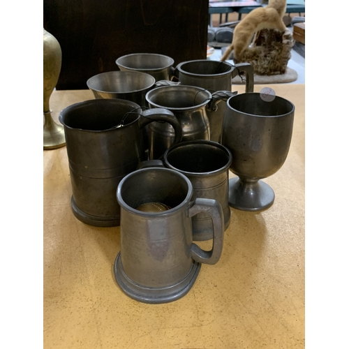 472 - A COLLECTION OF PEWTER TANKARDS
