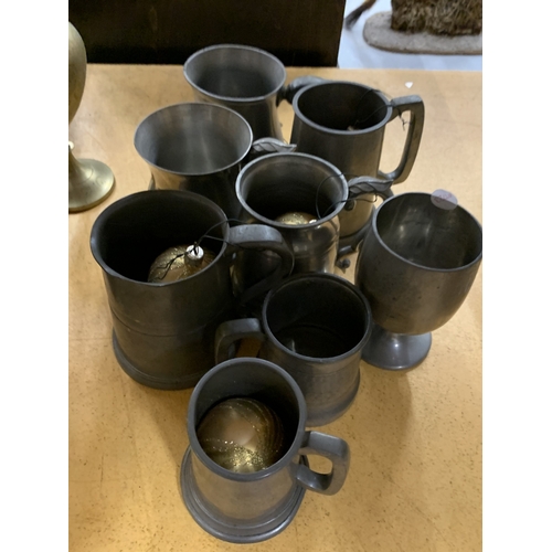 472 - A COLLECTION OF PEWTER TANKARDS
