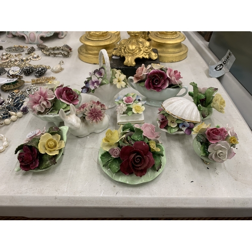 192 - AN COLLECTION OF CERAMIC POSIES