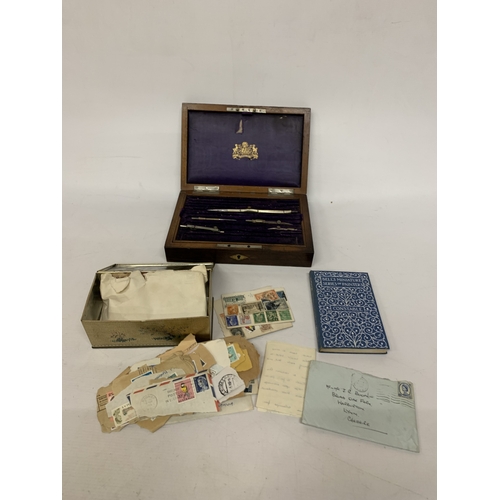 270 - A WOODEN CASED PART DRAUGHTSMAN SET, DECORATIVE TIN CONTAINING LOOSE STAMPS AND A CONSTABLE BELL'S M... 