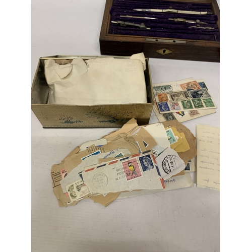 270 - A WOODEN CASED PART DRAUGHTSMAN SET, DECORATIVE TIN CONTAINING LOOSE STAMPS AND A CONSTABLE BELL'S M... 