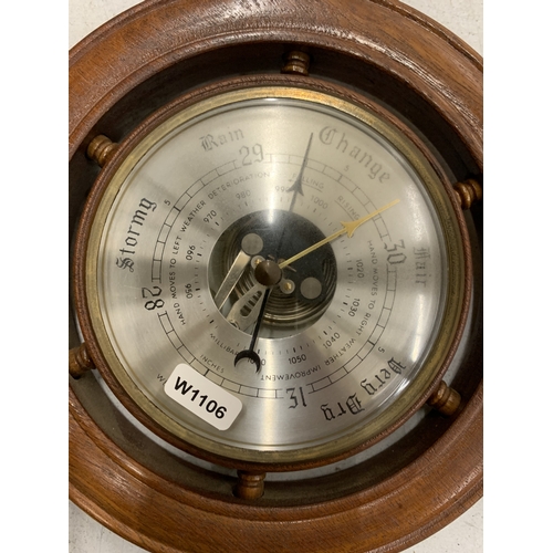 277 - A WOODEN BAROMETER IN THE FORM OF A SHIPS WHEEL, 15