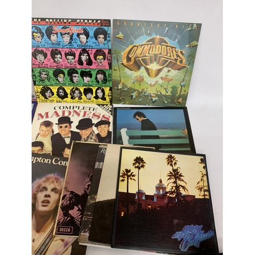 280 - AN ASSORTMENT OF LP'S TO INCLUDE MADNESS 'COMPLETE MADNESS', THE ROLLING STONES 'SOME GIRLS', THE CO... 