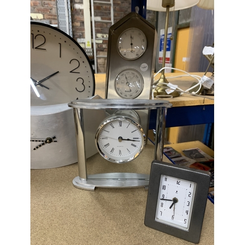 902 - FOUR CLOCKS AND A BAROMETER