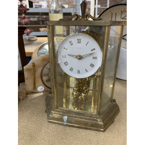 903 - SIX CLOCKS TO INCLUDE A WALL CLOCK, TWO CARRIAGE CLOCKS AN ANNIVERSARY CLOCK, ETC