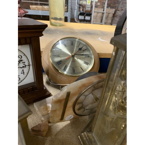 903 - SIX CLOCKS TO INCLUDE A WALL CLOCK, TWO CARRIAGE CLOCKS AN ANNIVERSARY CLOCK, ETC