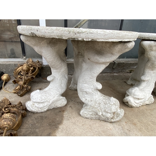 1506 - A PAINTED CONCRETE GARDEN TABLE WITH FISH PEDESTAL BASES