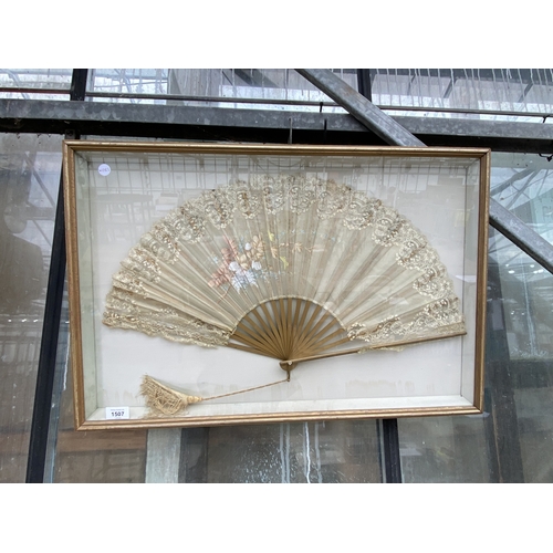 1507 - A FRAMED ORIENTAL FOLDING FAN