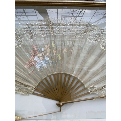 1507 - A FRAMED ORIENTAL FOLDING FAN