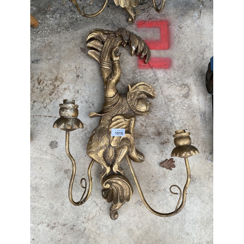 1515 - A PAIR OF DECORATIVE WOODEN GILT WALL CANDLE SCONCES WITH MONKEY DETAIL