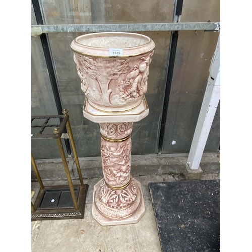 1519 - A DECORATIVE PINK CERAMIC JARDINAIRE WITH PEDESTAL STAND BASE A/F