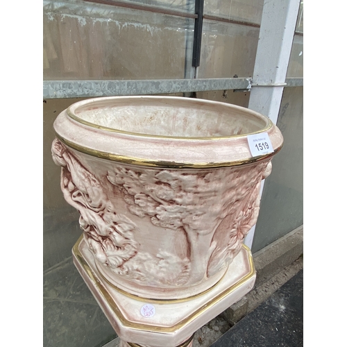 1519 - A DECORATIVE PINK CERAMIC JARDINAIRE WITH PEDESTAL STAND BASE A/F