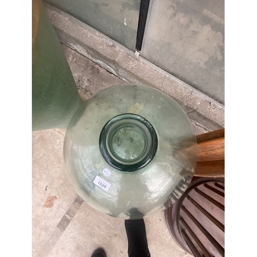 1529 - A LARGE GREEN GLASS CARBOUY