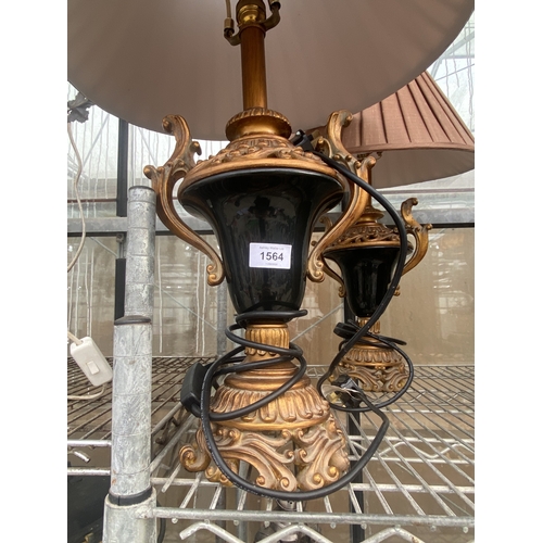1564 - A PAIR OF DECORATIVE GILT AND BLACK GLASS TABLE LAMPS WITH SHADES
