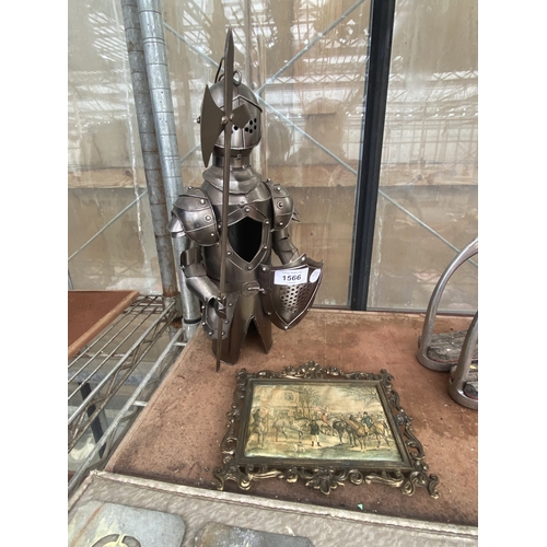 1566 - A METAL KNIGHT WINE BOTTLE COVER AND A SMALL FRAMED PRINT