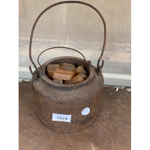 1579 - A SMALL CAST IRON COOKING POT
