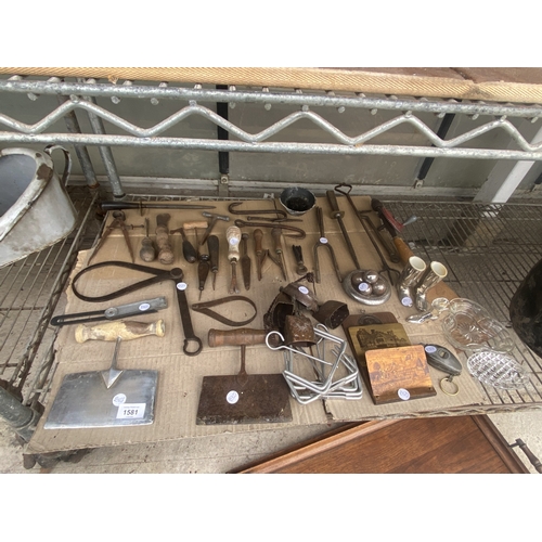 1581 - A LARGE ASSORTMENT OF VINTAGE ITEMS TO INCLUDE TOOLS, A LETTER RACK AND BELLS ETC
