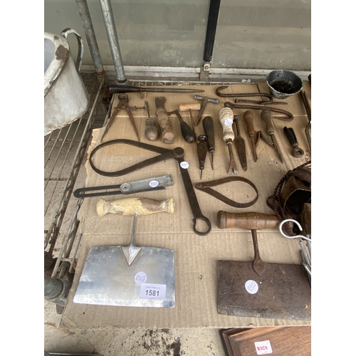 1581 - A LARGE ASSORTMENT OF VINTAGE ITEMS TO INCLUDE TOOLS, A LETTER RACK AND BELLS ETC