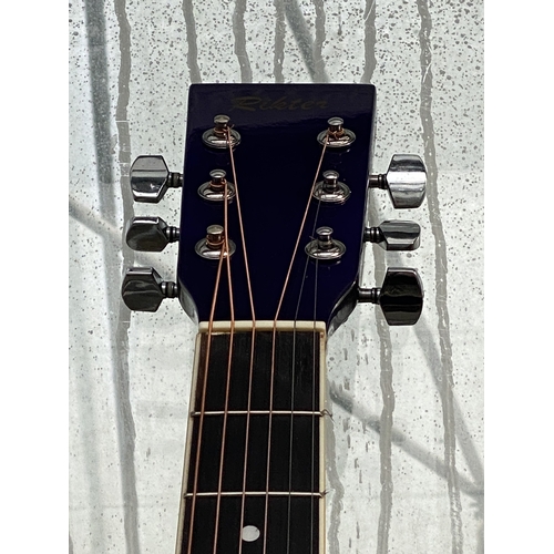 1603 - A PUROPLE RIKTER ACOUSTIC GUITAR