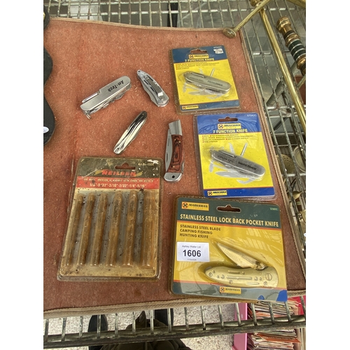 1606 - SEVEN POCKET KNIVES TO INCLUDE THREE NEW AND PACKAGED MARKSMAN, THREE OF WHICH ARE MULTITOOLS AND A ... 
