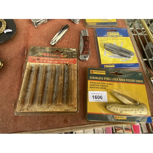 1606 - SEVEN POCKET KNIVES TO INCLUDE THREE NEW AND PACKAGED MARKSMAN, THREE OF WHICH ARE MULTITOOLS AND A ... 