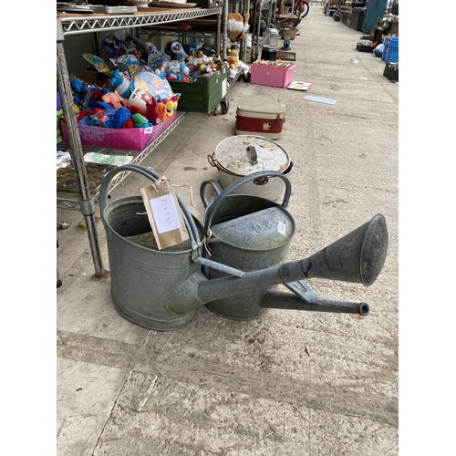 1635 - TWO GALVANISED METAL WATERING CANS