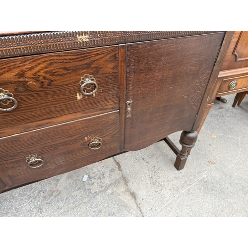 2662 - A MID 20TH CENTURY OAK SIDEBOARD WITH RAISED BACK, 54