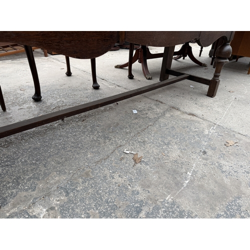 2662 - A MID 20TH CENTURY OAK SIDEBOARD WITH RAISED BACK, 54