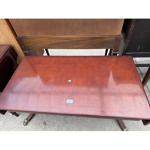 2671 - A MAHOGANY AND CROSSBANDED DROP LEAF COFFEE TABLE ON BRASS CLAW FEET