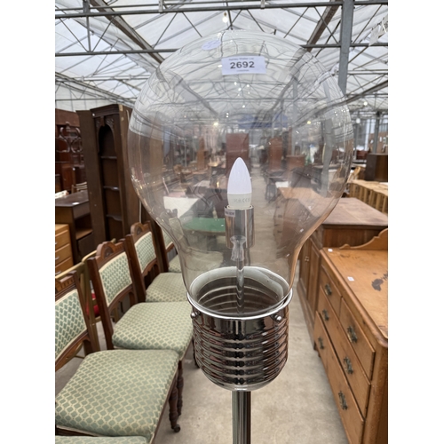 2692 - A STANDARD LAMP WITH THE TOP IN THE FORM OF A LIGHT BULB BEARING FEBRAL GROUP LTD LABEL
