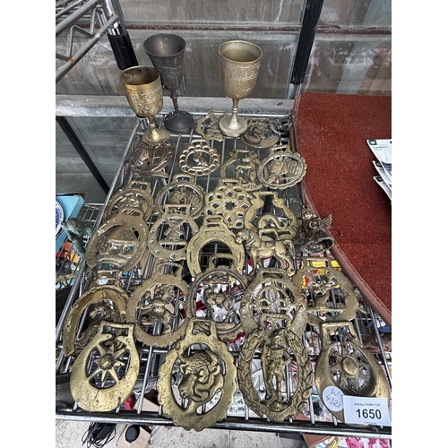 1650 - THREE BRASS GOBLETS AND AN ASSORTMENT OF HORSE BRASSES