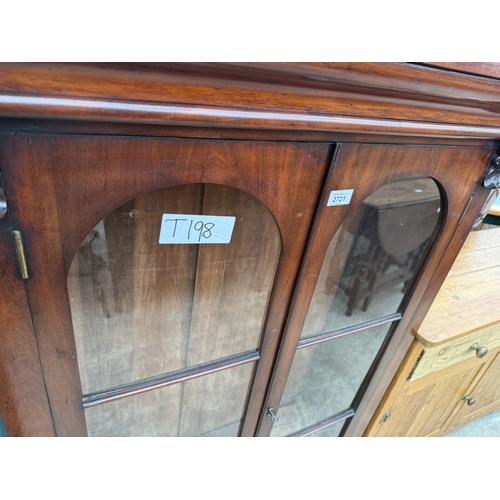 2721 - A VICTORIAN MAHOGANY BOOKCASE WITH ARCHED GLAZED DOORS, 31