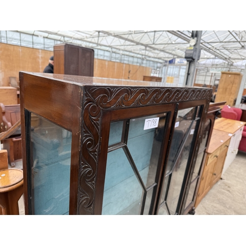 2722 - AN EARLY 20TH CENTURY MAHOGANY TWO DOOR GLAZED BOOKCASE, 35.5