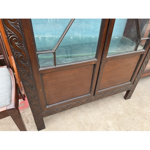 2722 - AN EARLY 20TH CENTURY MAHOGANY TWO DOOR GLAZED BOOKCASE, 35.5