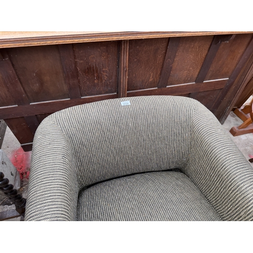 2724 - A RETRO CLUB CHAIR ON TAPERING LEGS