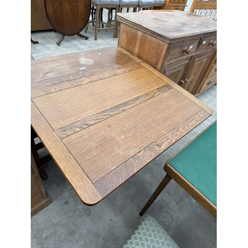2728 - A MID 20TH CENTURY OAK DROP LEAF TABLE