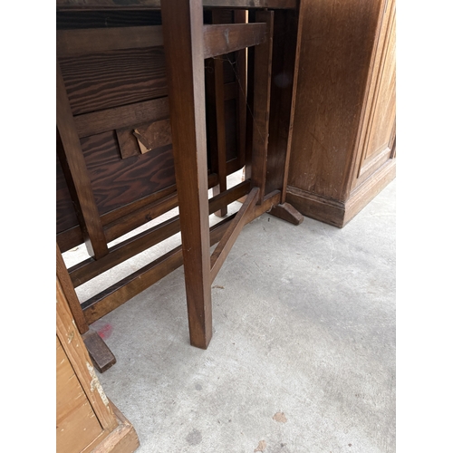 2728 - A MID 20TH CENTURY OAK DROP LEAF TABLE