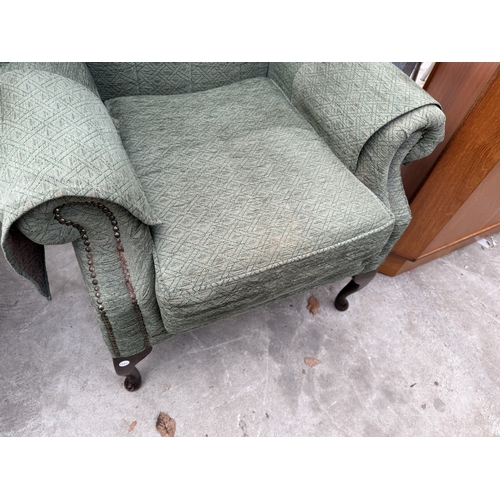 2740 - A PAIR OF WINGED FIRESIDE CHAIRS ON CABRIOLE LEGS AND LOW STOOL