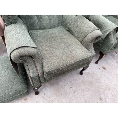 2740 - A PAIR OF WINGED FIRESIDE CHAIRS ON CABRIOLE LEGS AND LOW STOOL