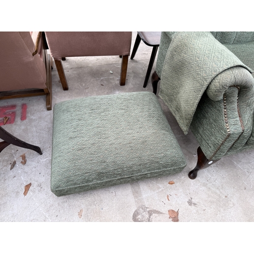 2740 - A PAIR OF WINGED FIRESIDE CHAIRS ON CABRIOLE LEGS AND LOW STOOL