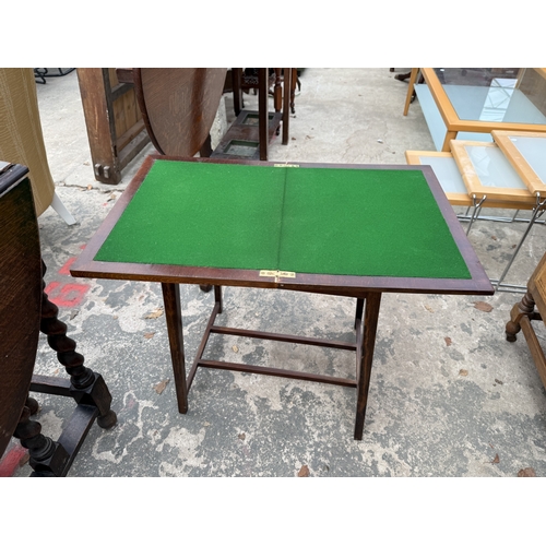2745 - AN EDWARDIAN MAHOGANY FOLD OVER GAMES TABLE