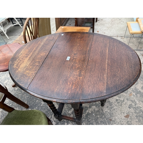 2746 - AN EARLY 20TH CENTURY OVAL OAK GATE LEG TABLE ON BARLEY TWIST LEGS, 40