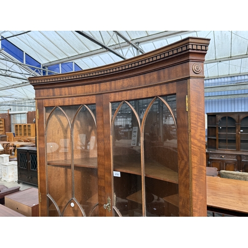 2763 - A MAHOGANY INVERTED BOW FRONTED CORNER CABINET WITH GLAZED UPPER PORTION AND DENTIL CORNICE, 36
