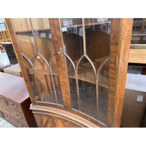 2763 - A MAHOGANY INVERTED BOW FRONTED CORNER CABINET WITH GLAZED UPPER PORTION AND DENTIL CORNICE, 36