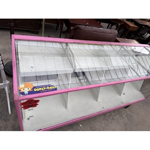 2765 - A PAINTED SHOP DISPLAY COUNTER, 71